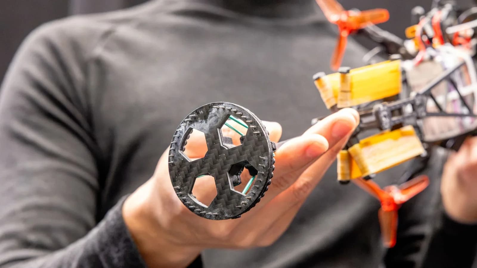 Snowshoe-inspired foot pad lets one-legged hopping robot cross sand and slippery ice