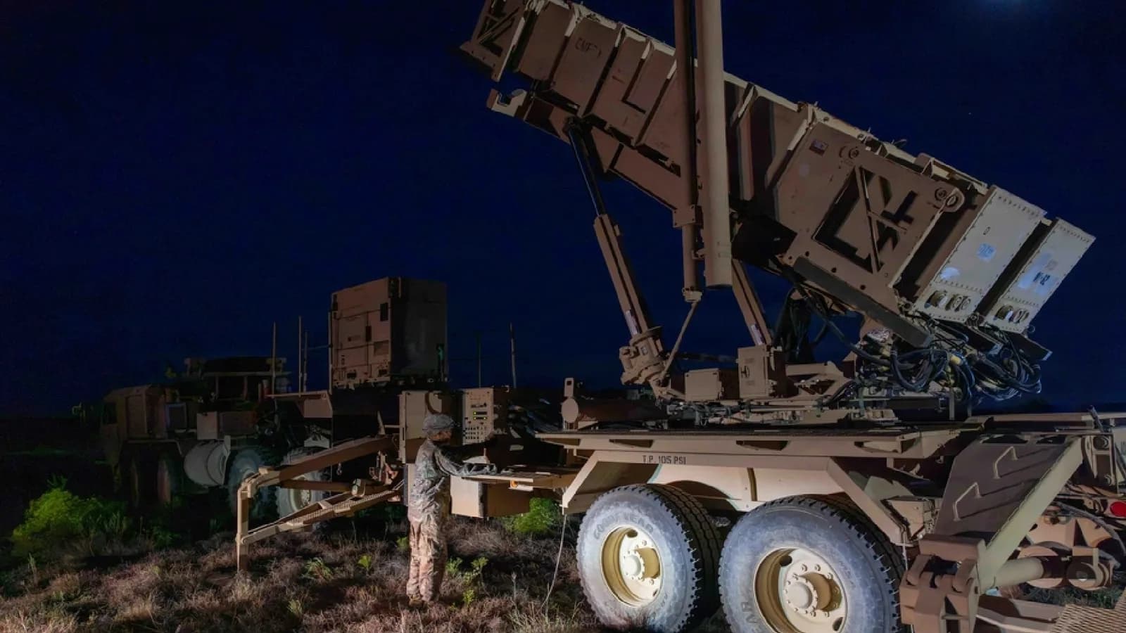 US Army drills nighttime Patriot reloads with crane truck at Fort Hood