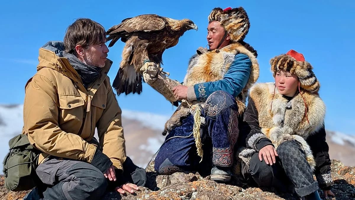 Presenter Simon Reeve with eagle hunters in Mongolia. Photo: BBC