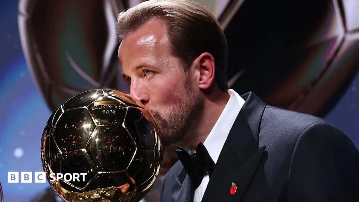 Harry Kane kisses the Ballon d'Or trophy. Image: Getty Images / BBC Sport