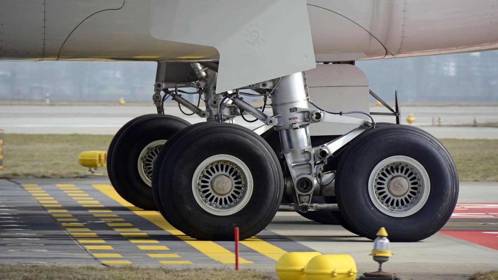 Aviation-grade carbon-ceramic brakes survive 1,832°F, weigh 75% lighter than steel